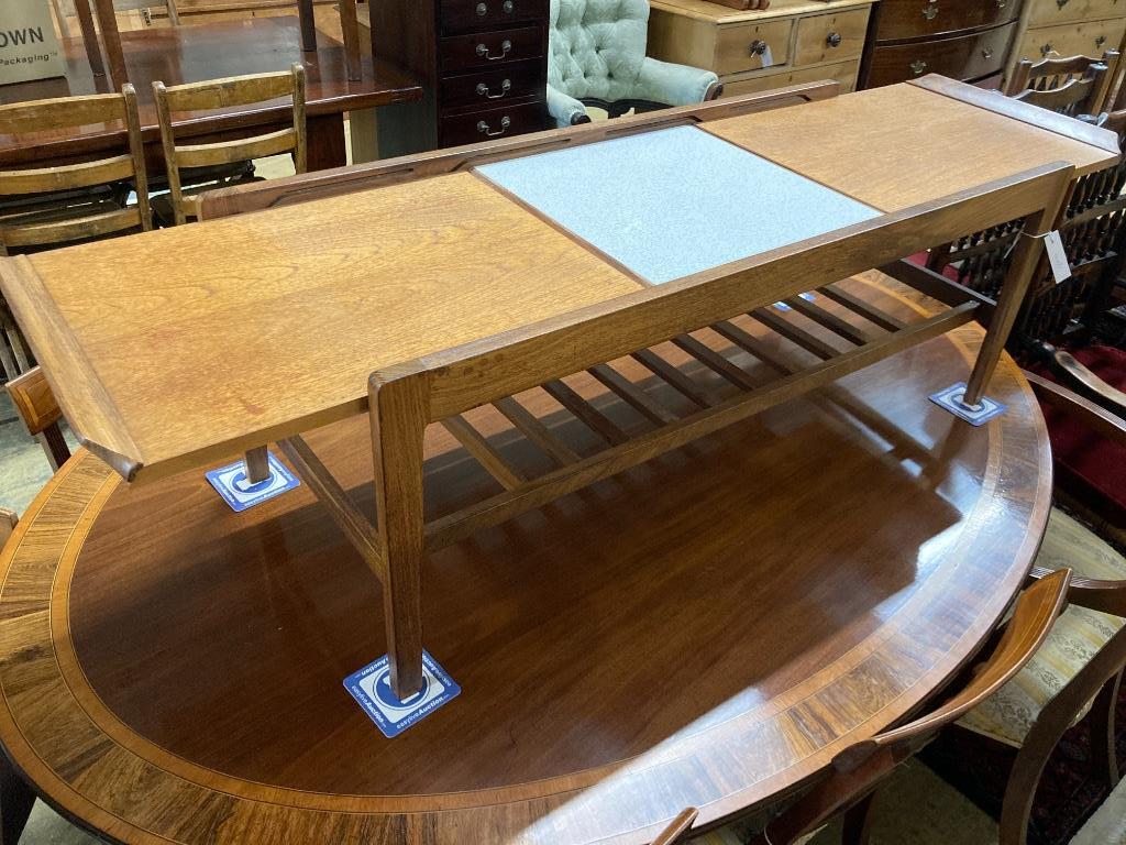 A Rempley teak sliding top coffee table, circa 1970